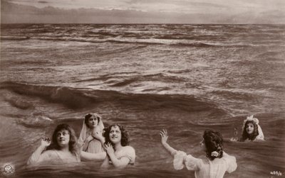 Five clothed women in the sea by French Photographer